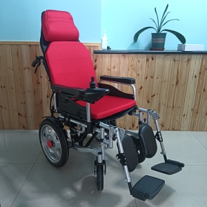 Red colour motorized wheel chair - ERN-CO HEALTHCARE LTD